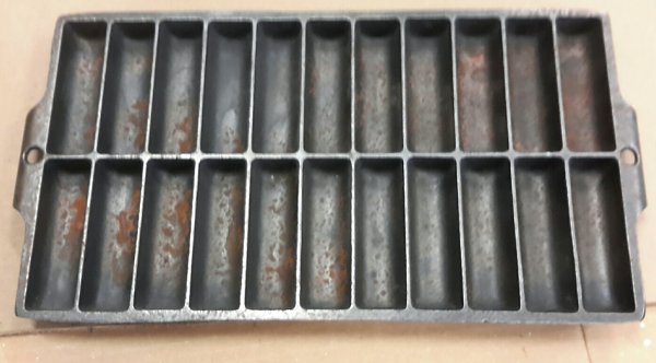Click image for larger version

Name:	Griswold bread stick pan 2-1_resized.jpg
Views:	341
Size:	90.5 KB
ID:	319551
