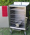 This is actually a Smokin' Tex 1460 Pro Series...which looks exactly the same except that it's 3" deeper and has an extra rung for a 6th rack
